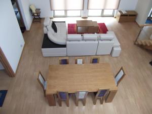 a living room with a couch and a table at Quinta dos Caibrais in Oliveira de Frades