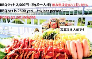 a advertisement for a food stand with meat and vegetables at Sunset Hill Bise in Motobu