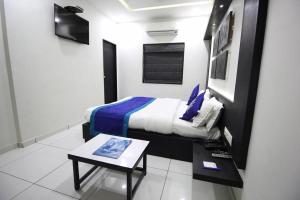 TV a/nebo společenská místnost v ubytování Hotel Paramount Inn