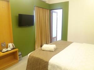 Letto o letti in una camera di Dago Highland Resort