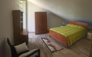 A bed or beds in a room at Casa Daniela