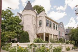 a large house with a turret at Charming Harvard Victorian in Cambridge