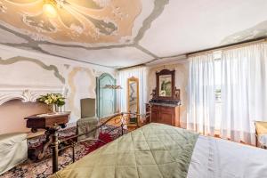 Кровать или кровати в номере Villa De Rubeis Florit