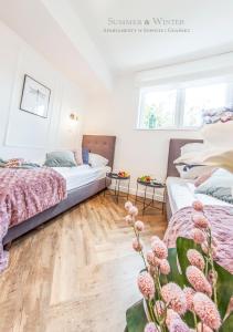 Posteľ alebo postele v izbe v ubytovaní Family Luxury Pure Old Town Apartament 1-8, 2 sypialnie i salon, parking pub, 60m2