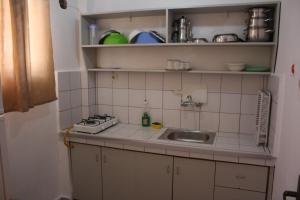Η κουζίνα ή μικρή κουζίνα στο Orçin Apart Hotel