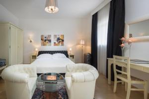 Voodi või voodid majutusasutuse Hotel Corsignano toas