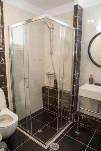 Koupelna v ubytování Tolo sea view