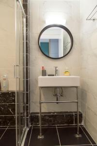 Koupelna v ubytování Tolo sea view