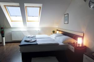 Postel nebo postele na pokoji v ubytování Residence Vysta