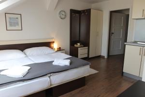 Posteľ alebo postele v izbe v ubytovaní Residence Vysta