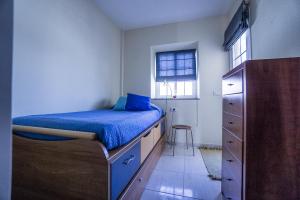 Postel nebo postele na pokoji v ubytování Rooms in El Medano + 4 fotografie