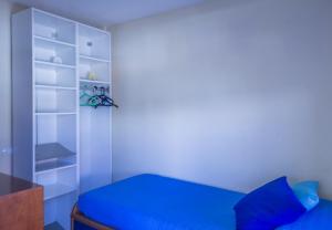 Postel nebo postele na pokoji v ubytování Rooms in El Medano