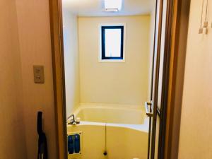 Ванна кімната в Midtown Sakura Apartment House 102 予約者だけの空間 A space just for you