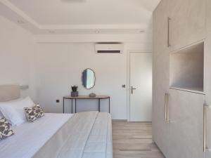 A bed or beds in a room at Bright Coast Superior