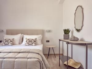 A bed or beds in a room at Bright Coast Superior