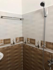 Koupelna v ubytování An Ngọc Linh Hotel + 37 fotografií