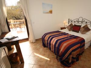 Posteľ alebo postele v izbe v ubytovaní Hotel Rural Molino del Puente Ronda