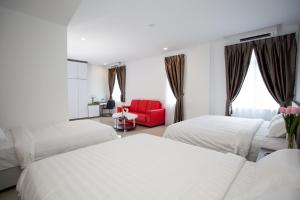 Voodi või voodid majutusasutuse Twenty Nine Hotel toas