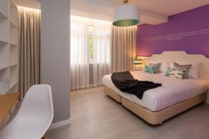 Letto o letti in una camera di Chic Studios