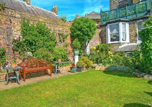 A garden outside Number One Guesthouse