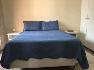 Ένα ή περισσότερα κρεβάτια σε δωμάτιο στο Apartamento Frente mar Meireles