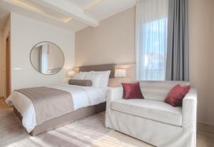 Кровать или кровати в номере Hotel Villa Gracia