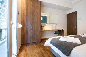 A bed or beds in a room at TONI'S 2BD Stay in Charming Historical centre
