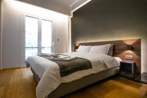 A bed or beds in a room at TONI'S 2BD Stay in Charming Historical centre