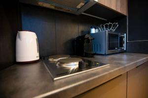 A kitchen or kitchenette at TONI'S 2BD Stay in Charming Historical centre