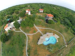 an aerial view of a house on a hill at Lake Villa Resort in Tissamaharama