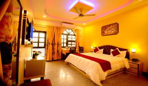 Aman Homestay, A Boutique Hotel客房内的一张或多张床位