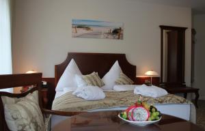 Krevet ili kreveti u jedinici u okviru objekta Avalon Hotel Bellevue