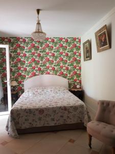 מיטה או מיטות בחדר ב-Mas d'Azur