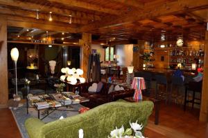 Posezení v ubytování Mauberme Mountain Boutique Hotel