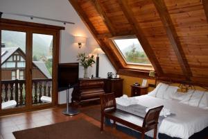 Posezení v ubytování Mauberme Mountain Boutique Hotel + 37 fotografií