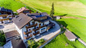 an overhead view of a house with a yard at Villa Hilde in San Cassiano