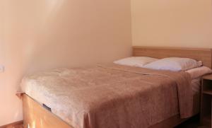 Katil atau katil-katil dalam bilik di Legend Guest House