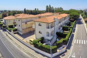 arial view of a building on a street at Villetta Tina in Vada
