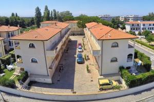 an aerial view of a large house with a driveway at Villetta Tina in Vada