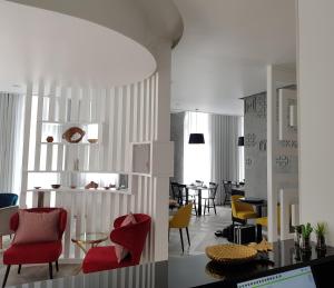 Uma área de estar em Thomar Boutique Hotel
