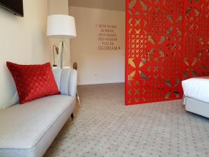Uma área de estar em Thomar Boutique Hotel