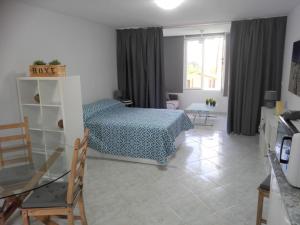 Łóżko lub łóżka w pokoju w obiekcie Large Loft Sueño Azul ocean view