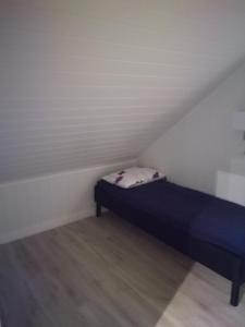 Tempat tidur dalam kamar di Presterudveien 125