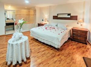 Voodi või voodid majutusasutuse Hotel LP Columbus toas