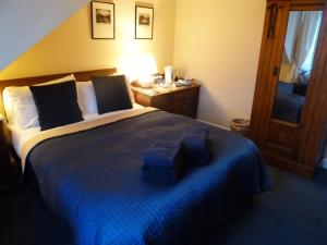 Postel nebo postele na pokoji v ubytování Burnside Guest House
