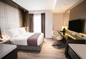 A television and/or entertainment centre at Hotel XYZ