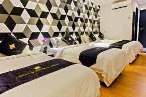Postel nebo postele na pokoji v ubytování Mercury Boutique Hotel