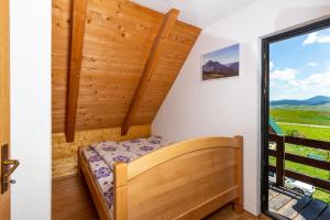 Letto o letti in una camera di Guesthouse Wolf
