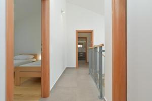 Postel nebo postele na pokoji v ubytování House Kazali 1749