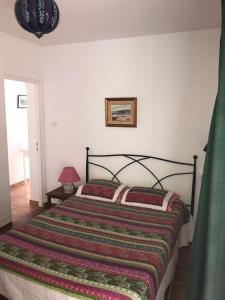Postel nebo postele na pokoji v ubytování Jardin Andaluz veleta